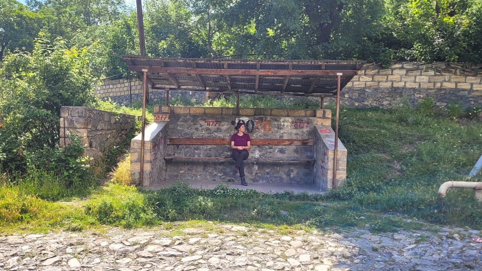 Waiting at a bus stop in the village Kis, Azerbaijan