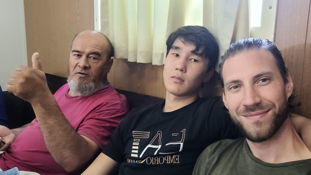 Killing time while talking with truckers and passengers on the Caspian Sea ferry